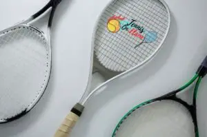 When did metal tennis rackets start?